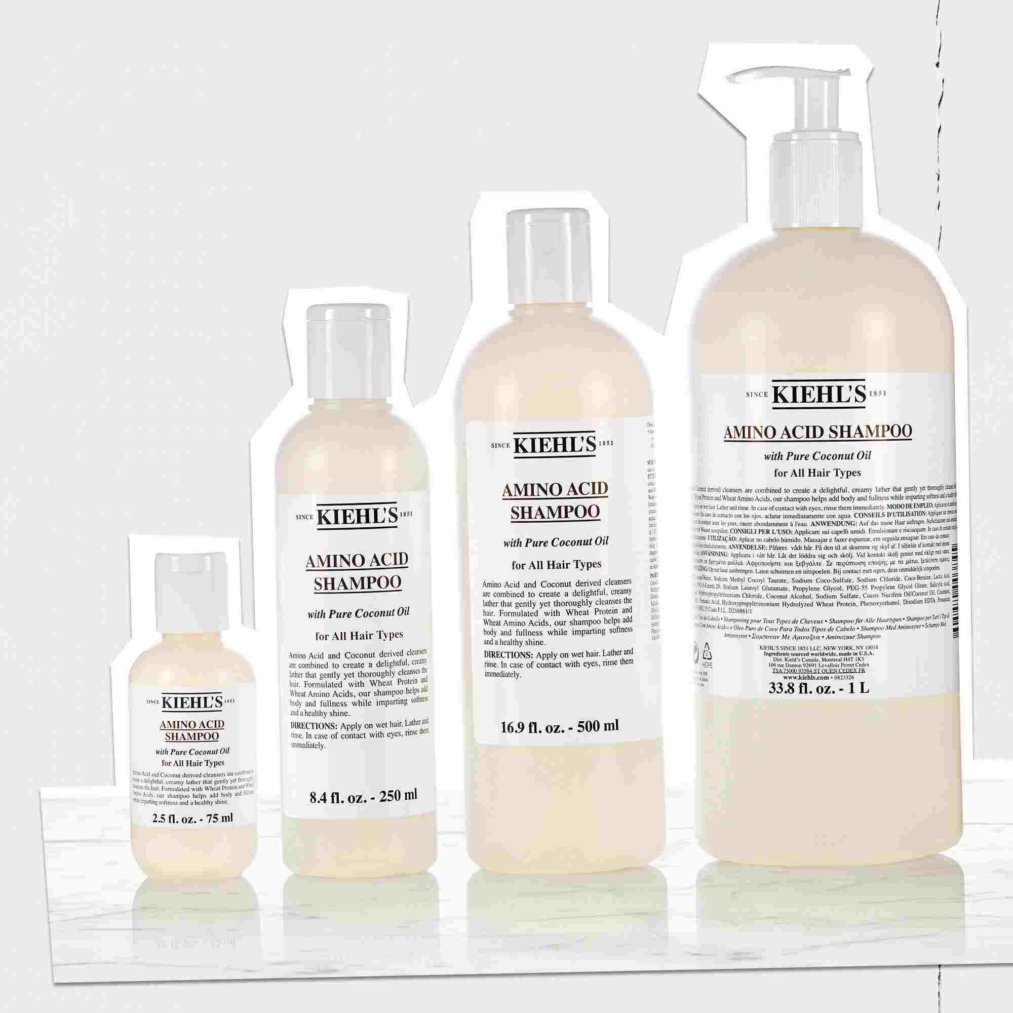 Gama butelek szamponu Kiehl's Amino Acid w rożnych rozmiarach