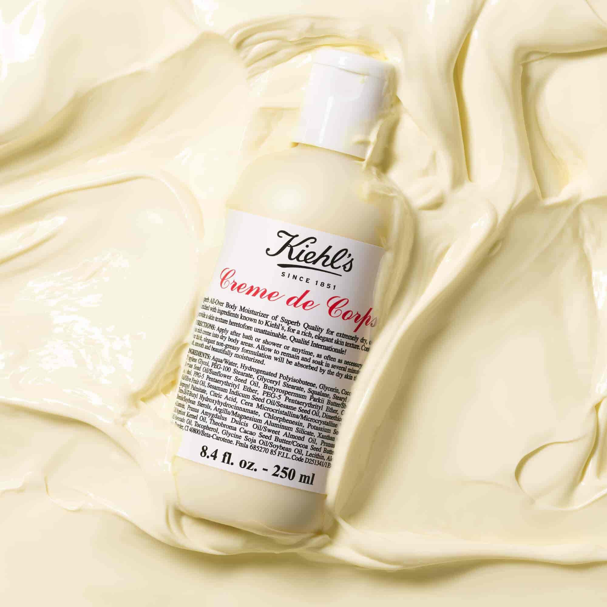 Butelka Kiehl's Creme de Corps w dużej ilości mleczka do ciała o wyraźnej konsystencji
