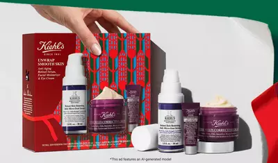 Hydrating Holiday Hits" skincare gift set on a green background, featuring Ultra Facial Cream and Creamy Eye Treatment with Avocado in festive packaging.